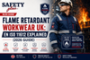Welder wearing EN ISO 11612 flame retardant coveralls in a UK fabrication workshop