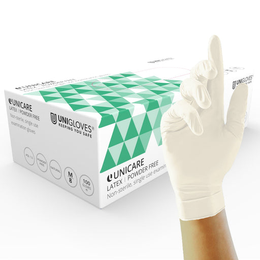 white latex gloves by unigloves in medium size